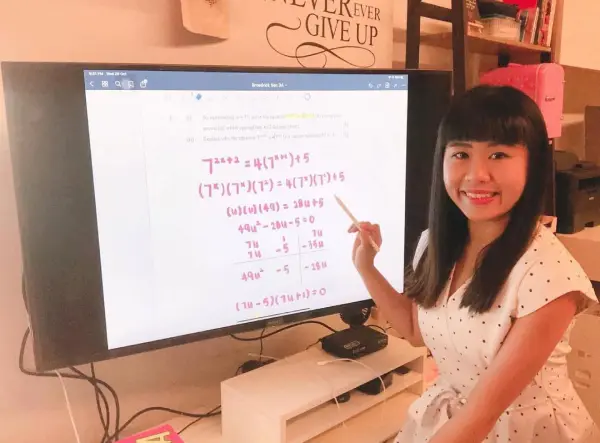 May teaching her younger siblings